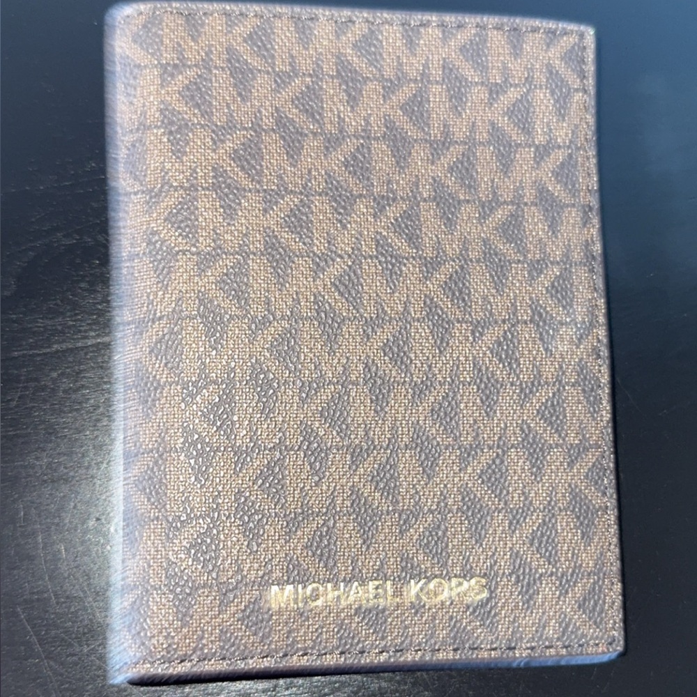 Michael Kors Signature Brown passport holder with room for credit cards